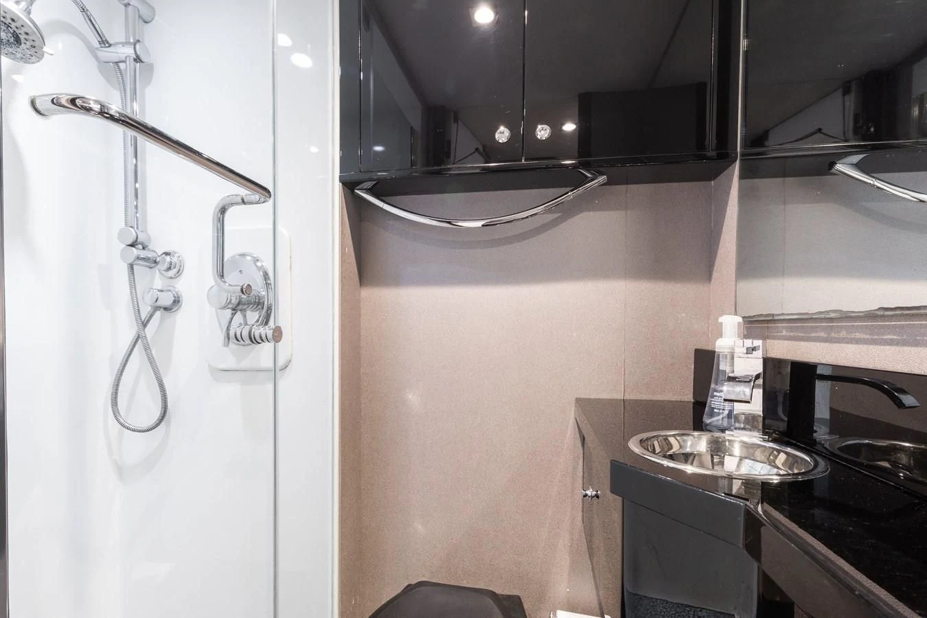 a bathroom with a sink and a mirror aboard ASHLEY Yacht for Sale