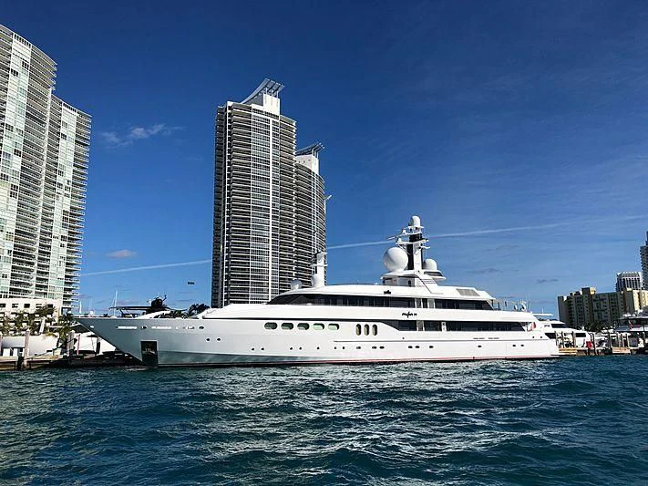 a large white boat in the water aboard MYLIN IV Yacht for Sale