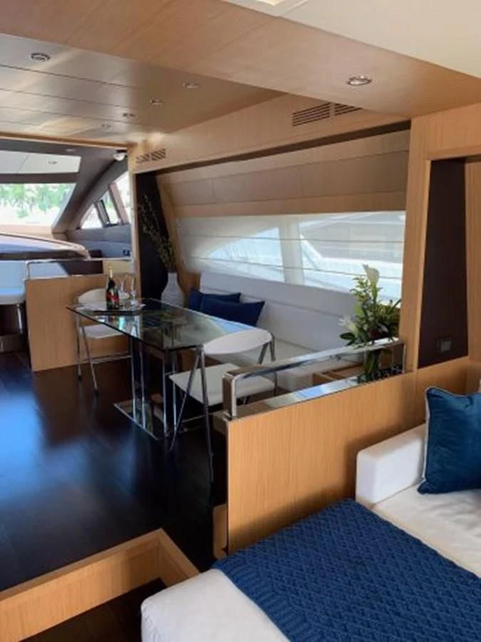 a room with a table and chairs aboard 2013 RIVA 75 VENERE SUPER Yacht for Sale