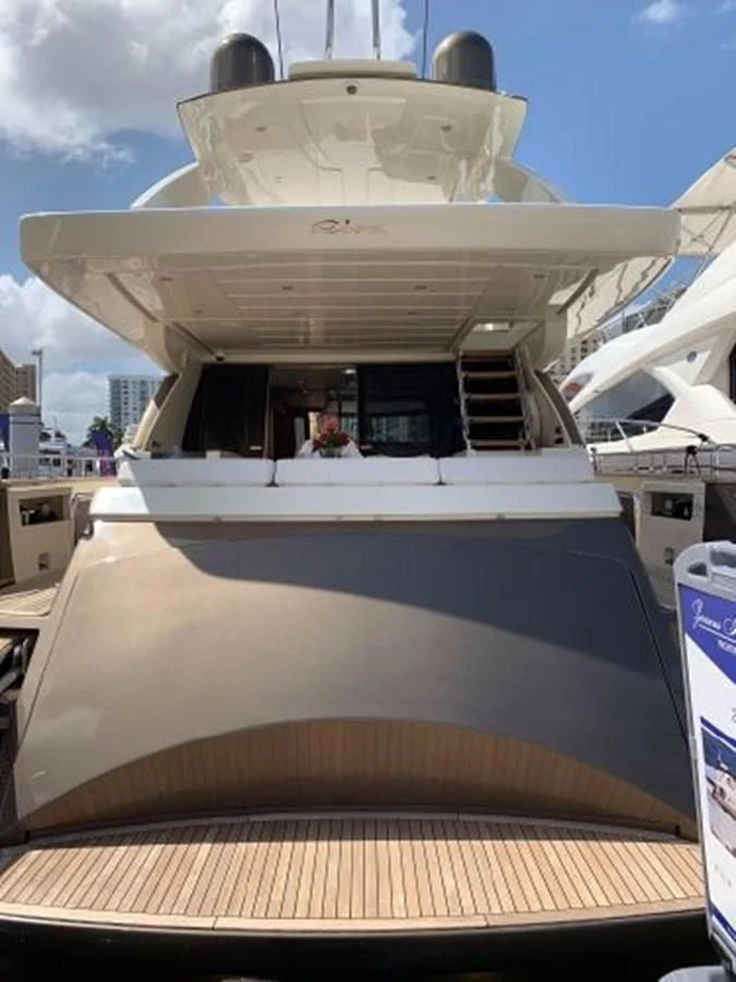 a large white boat aboard 2013 RIVA 75 VENERE SUPER Yacht for Sale