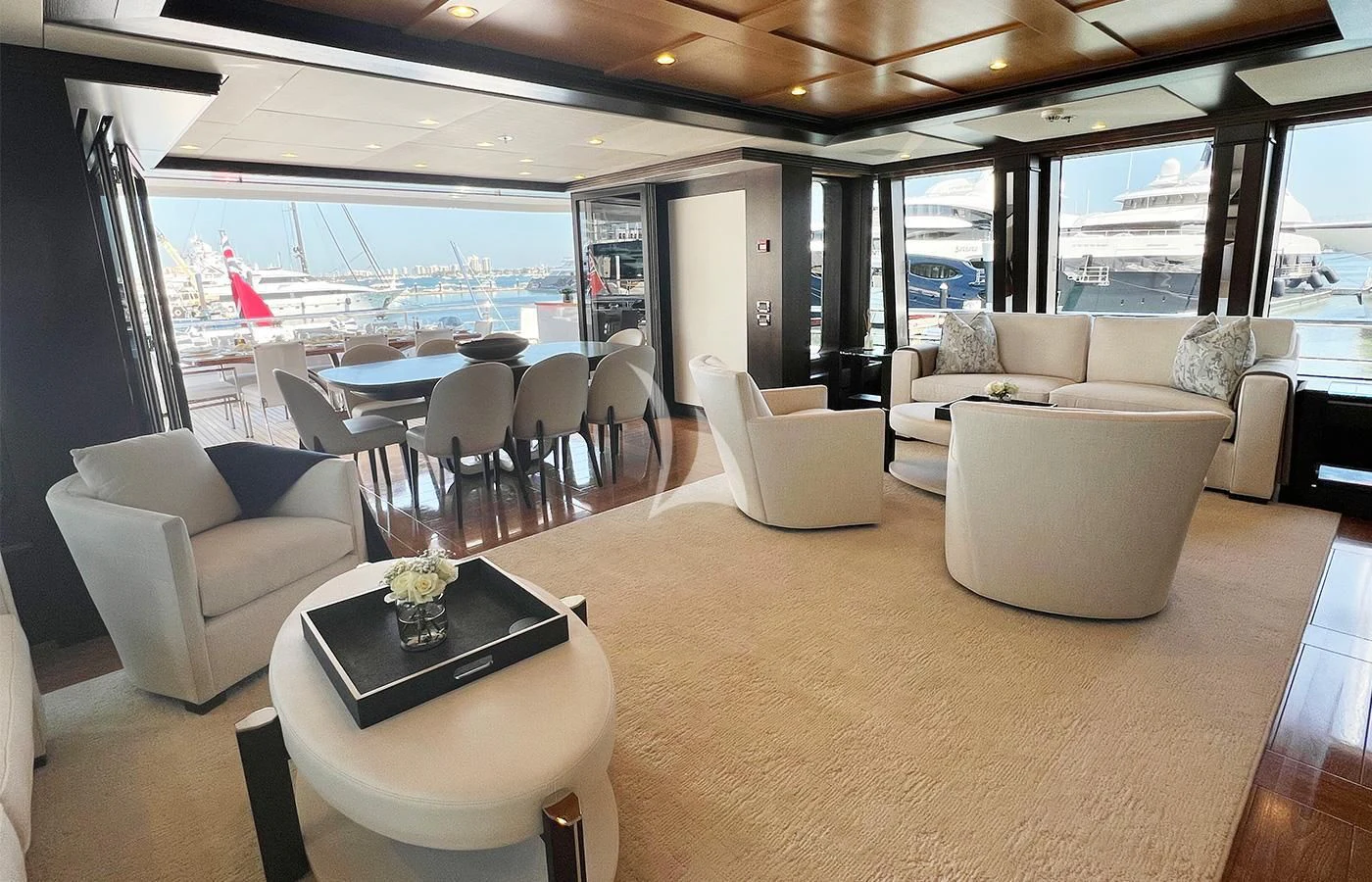 a living room with a large window aboard SPORT Yacht for Sale