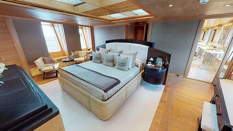 a large bedroom with a bed aboard SPORT Yacht for Sale