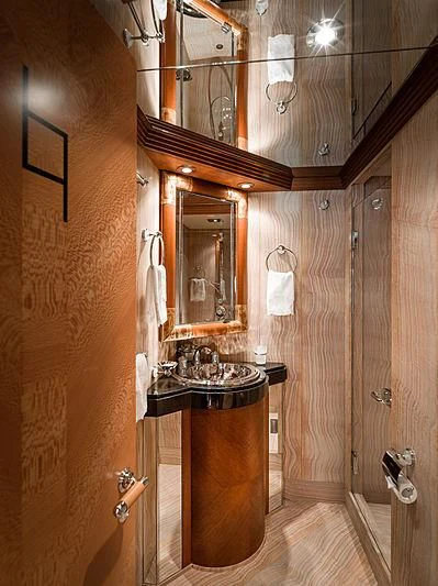 a bathroom with a mirror and a sink aboard SPORT Yacht for Sale