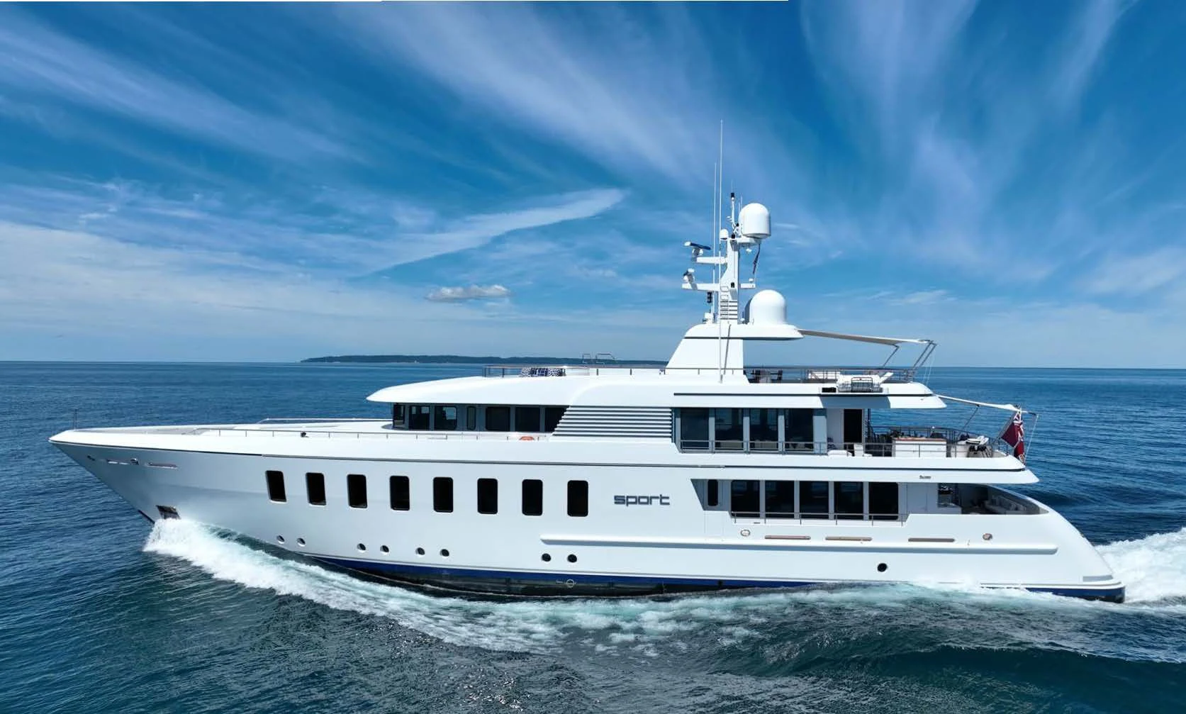 a white yacht on the water aboard SPORT Yacht for Sale