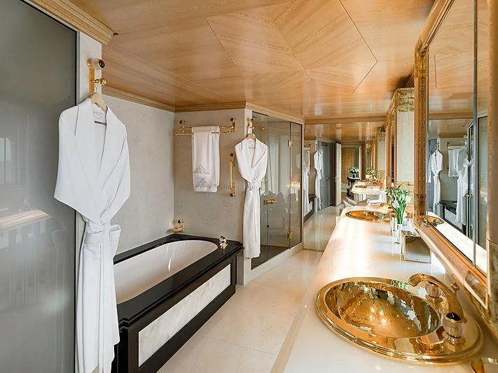 a bathroom with a large bathtub aboard SPORT Yacht for Sale