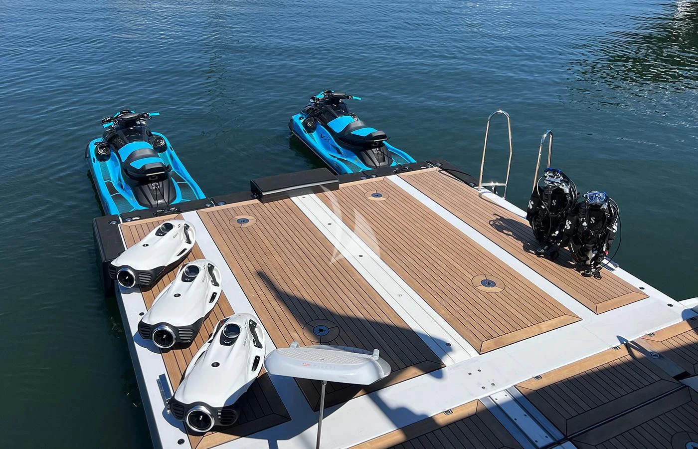 a boat with a motor attached to it aboard SPORT Yacht for Sale