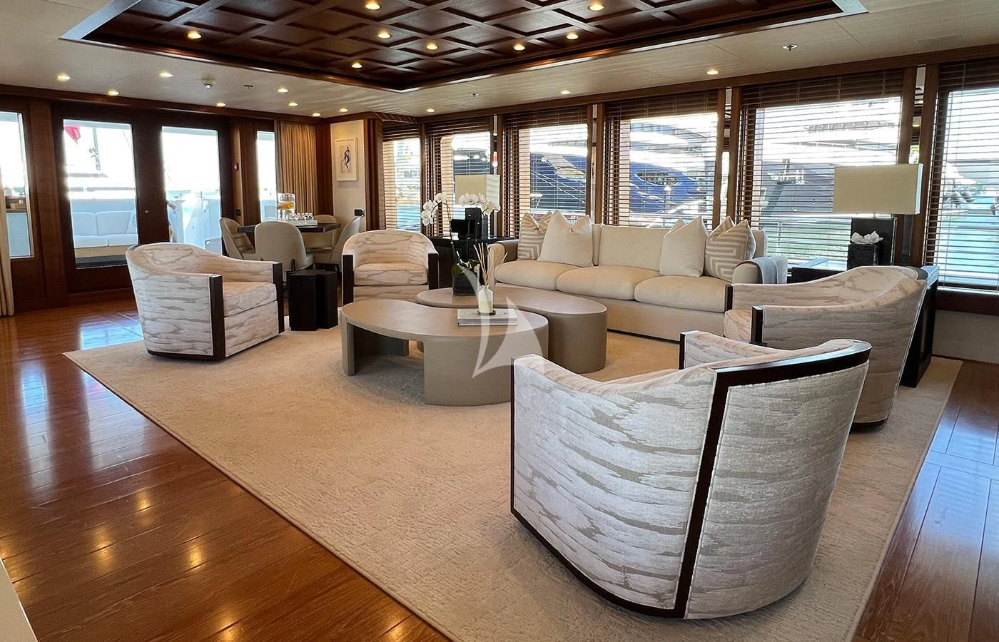 a large living room with a large window aboard SPORT Yacht for Sale