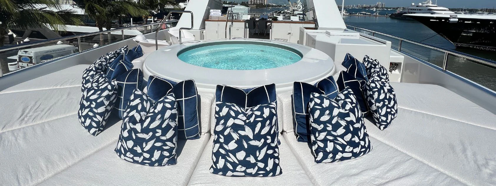 a table with chairs on it aboard SPORT Yacht for Sale
