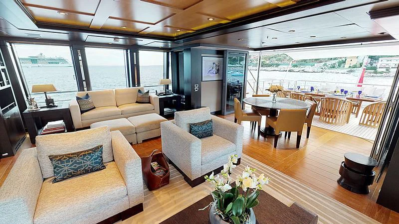 a living room with a large window aboard SPORT Yacht for Sale