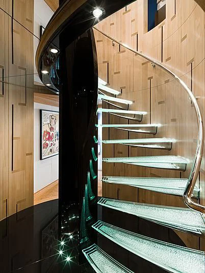 a staircase with a spiral staircase aboard SPORT Yacht for Sale