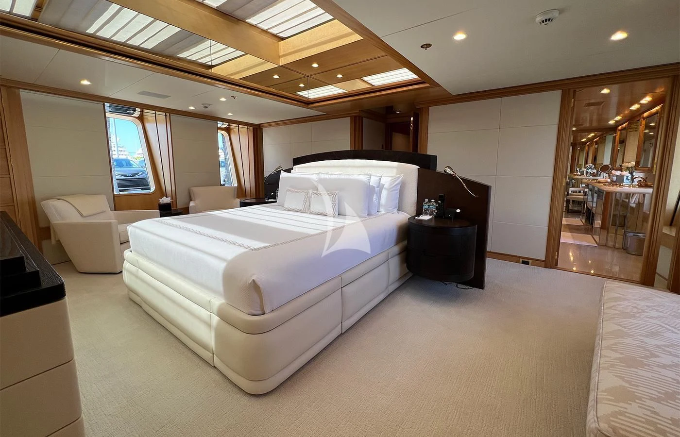 a large room with a bed and a large mirror aboard SPORT Yacht for Sale