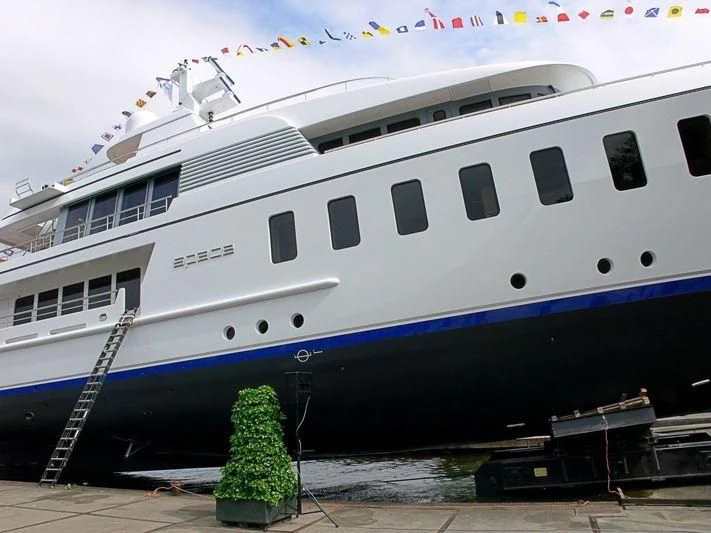 a large cruise ship docked aboard SPORT Yacht for Sale