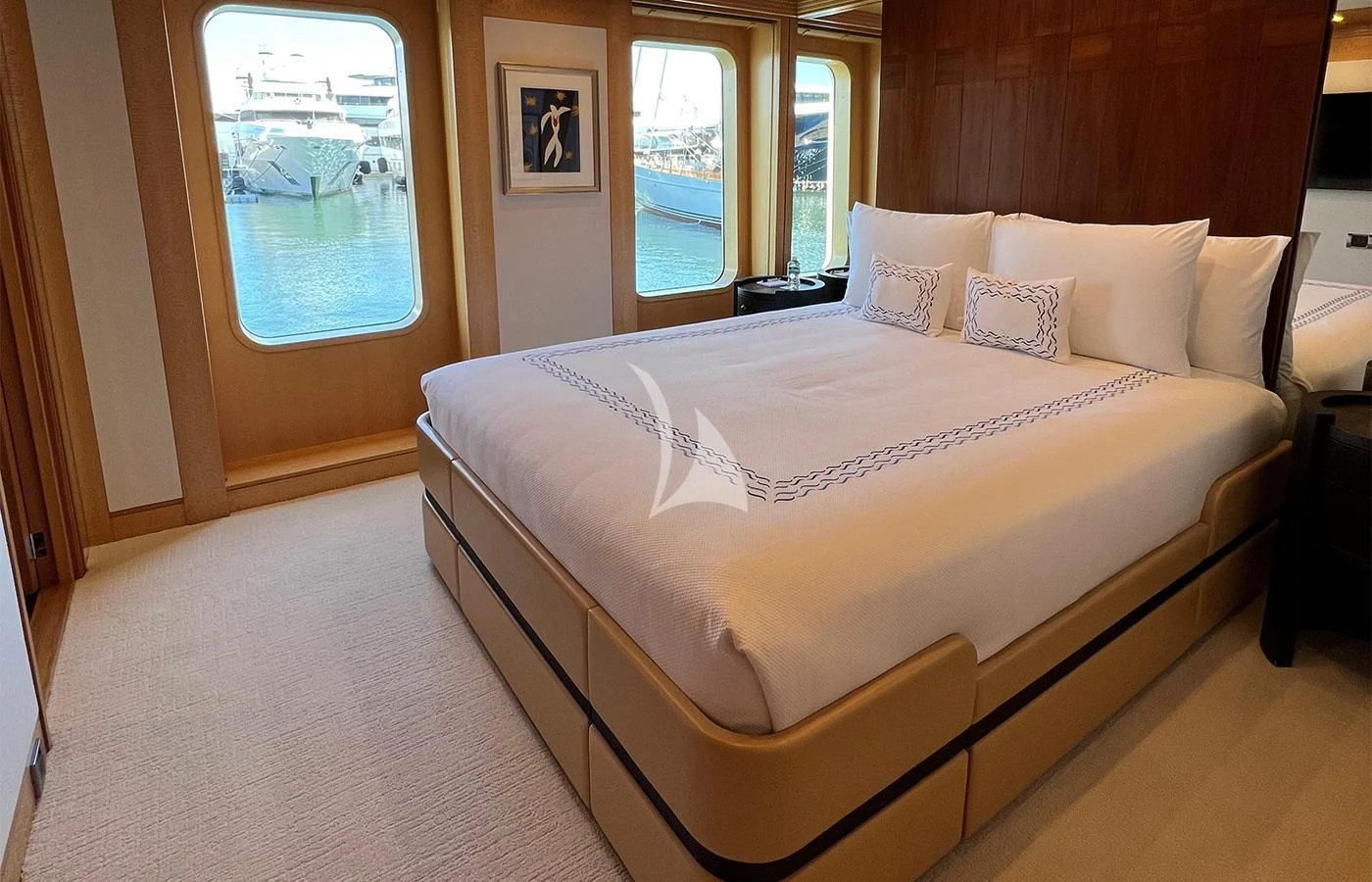 a bed with white sheets aboard SPORT Yacht for Sale