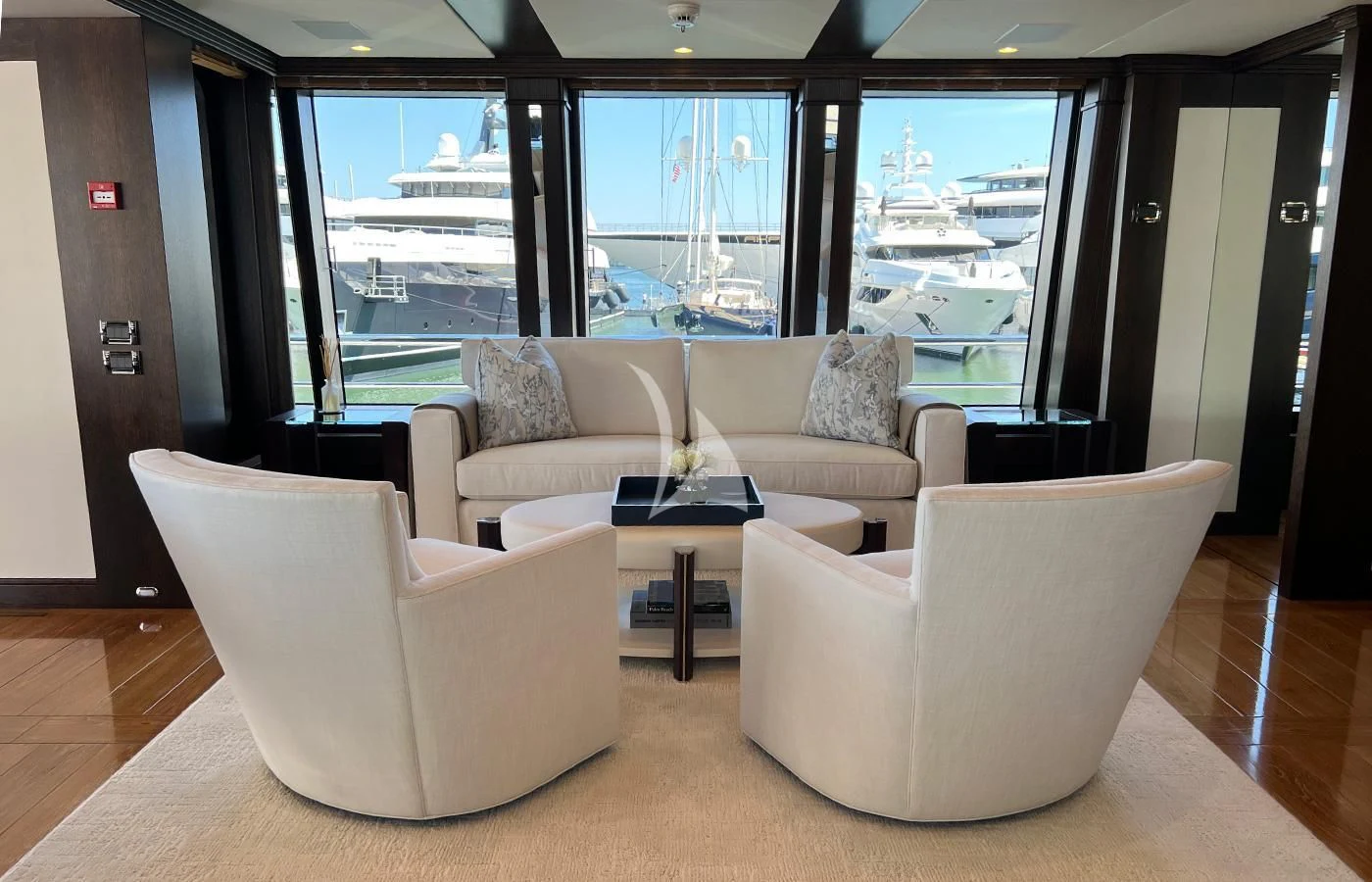 a room with a couch and a table and a window aboard SPORT Yacht for Sale