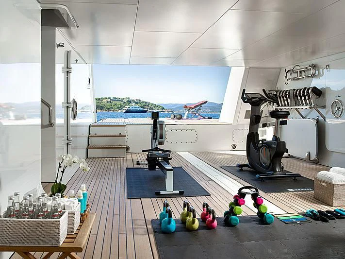 a room with a large screen aboard SPORT Yacht for Sale