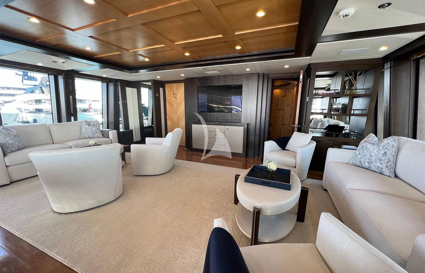 a living room with a large window aboard SPORT Yacht for Sale