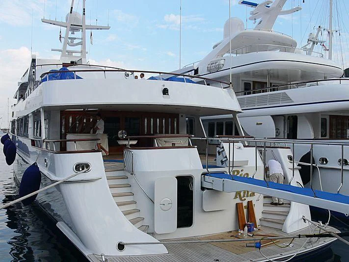 a boat docked at a pier aboard RIO RITA Yacht for Sale