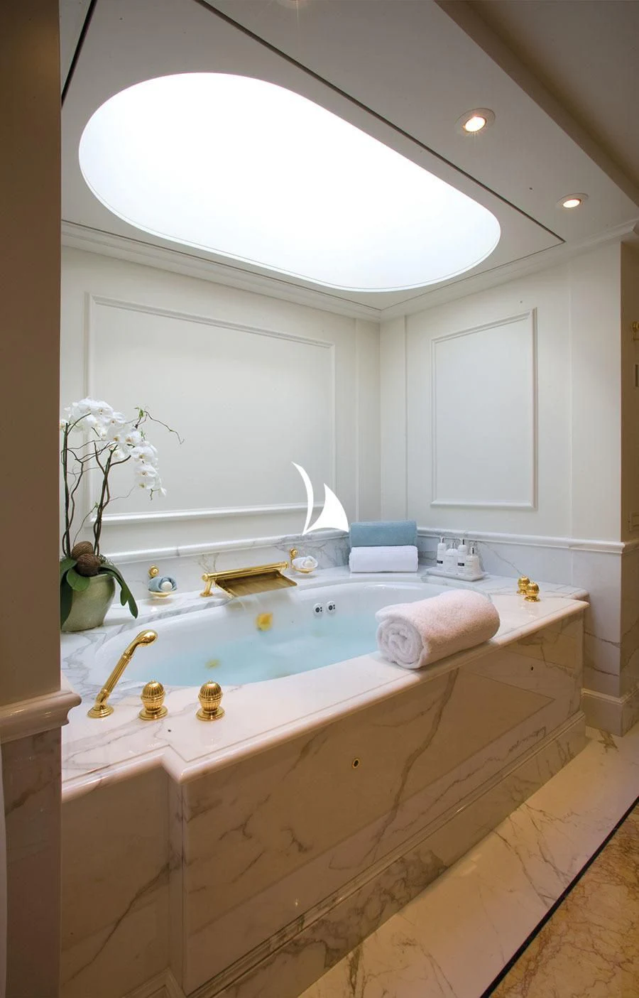 a bathroom with a large bathtub aboard UTOPIA Yacht for Sale
