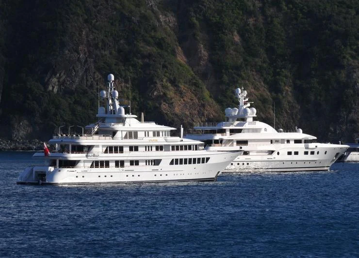 a couple of white boats on water aboard UTOPIA Yacht for Sale