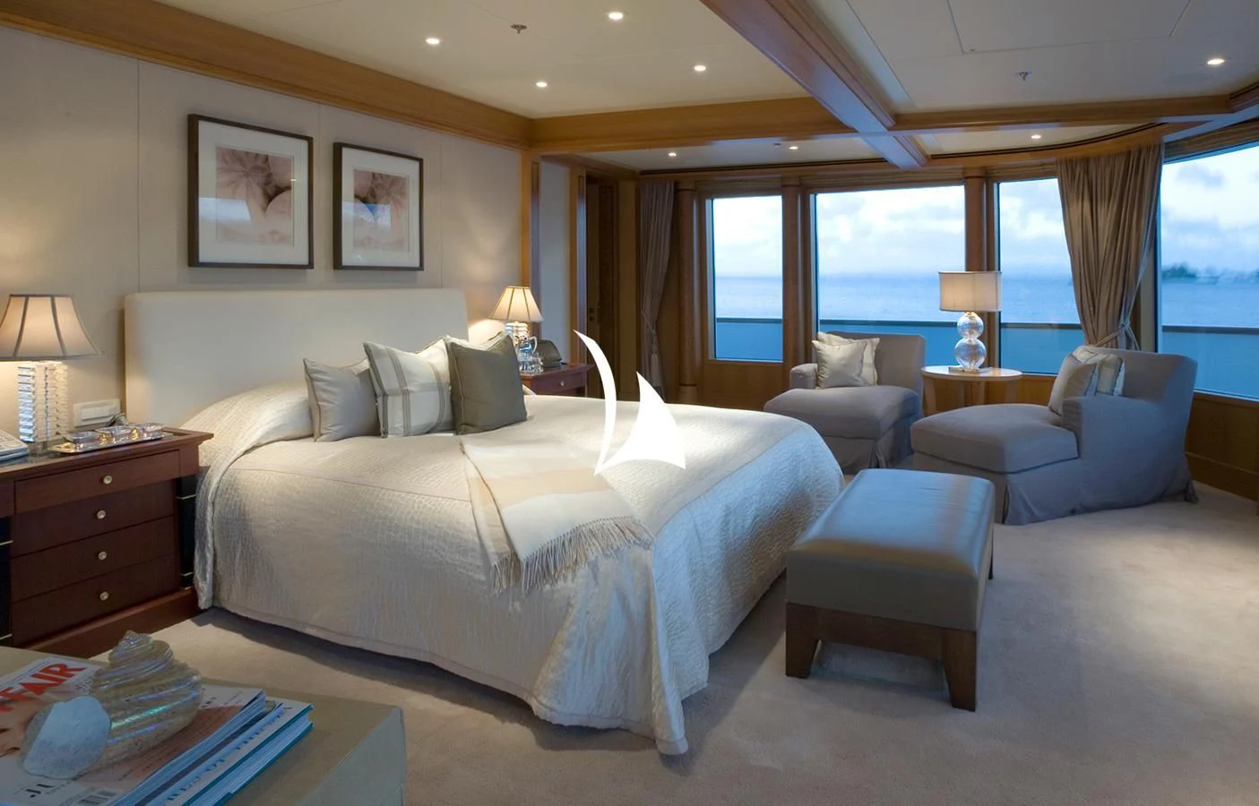 a large bed in a hotel room aboard UTOPIA Yacht for Sale