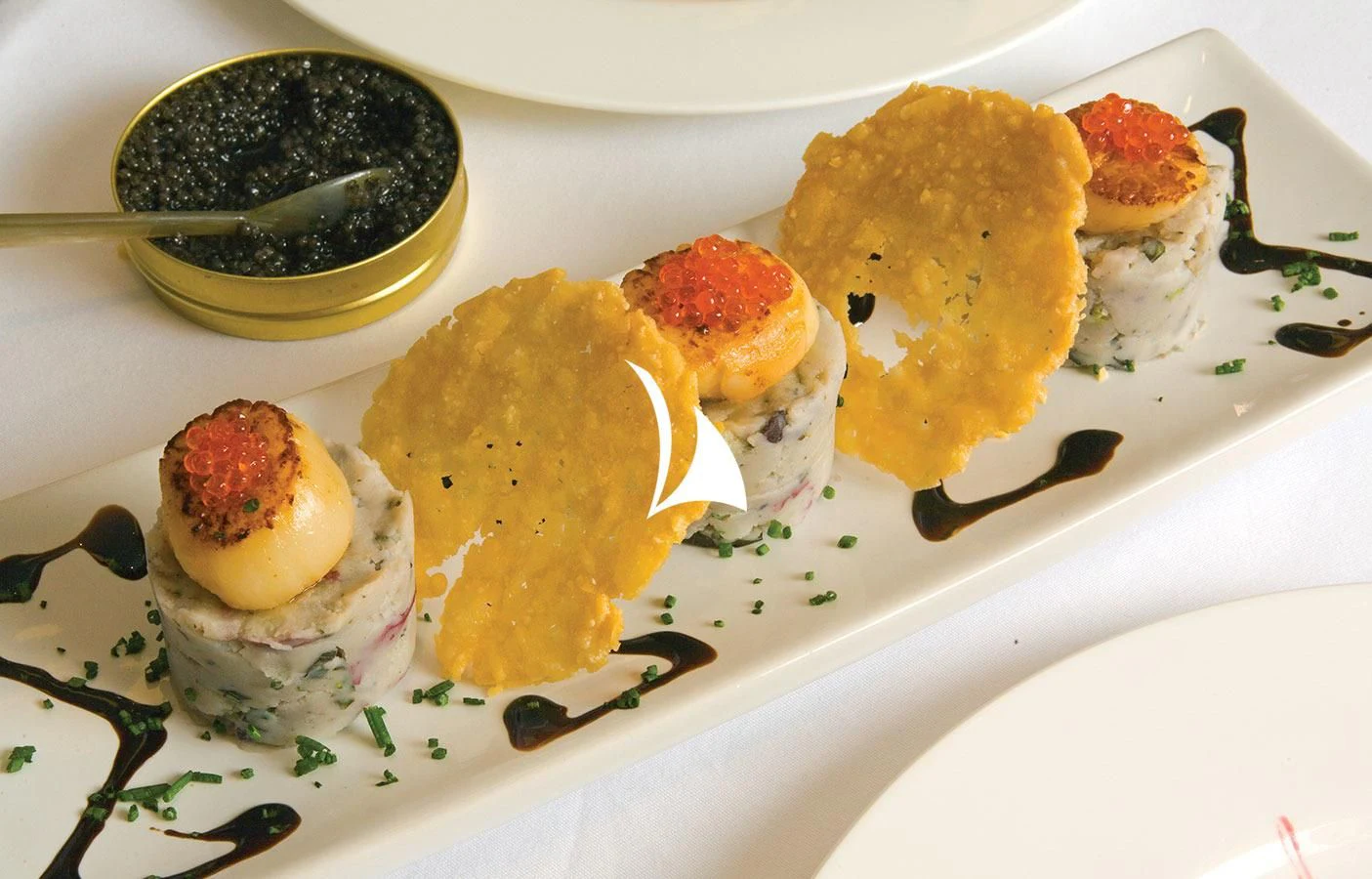 a plate of food aboard UTOPIA Yacht for Sale