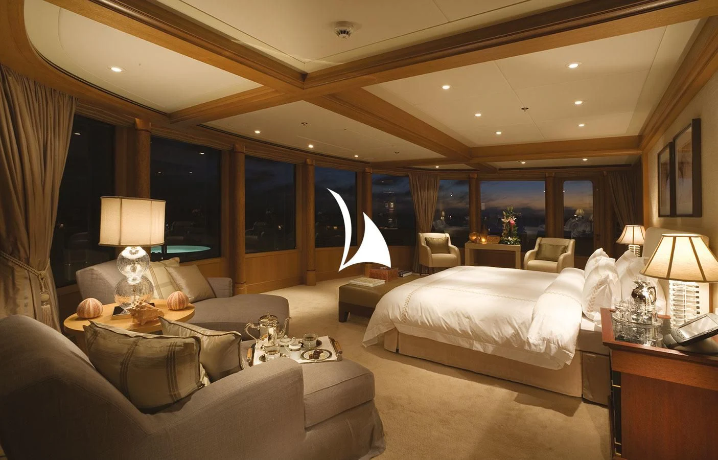 a hotel room with a large bed aboard UTOPIA Yacht for Sale