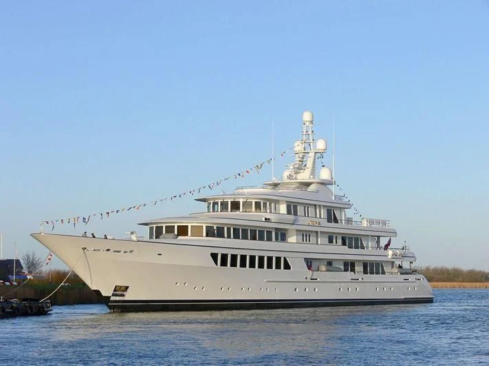 a large white ship aboard UTOPIA Yacht for Sale