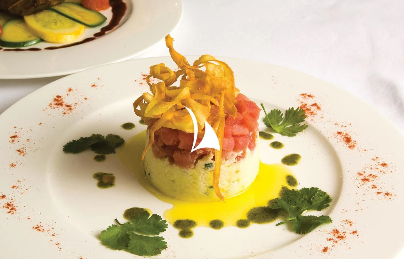 a plate of food aboard UTOPIA Yacht for Sale