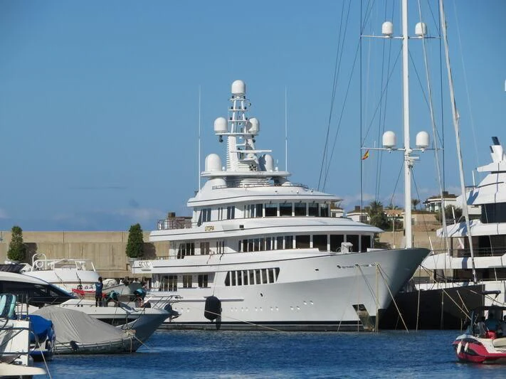 a large white boat in the water aboard UTOPIA Yacht for Sale