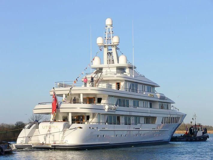 a large white ship aboard UTOPIA Yacht for Sale