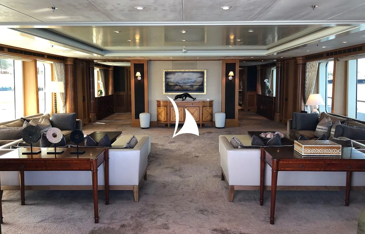 a living room with a large screen aboard UTOPIA Yacht for Sale