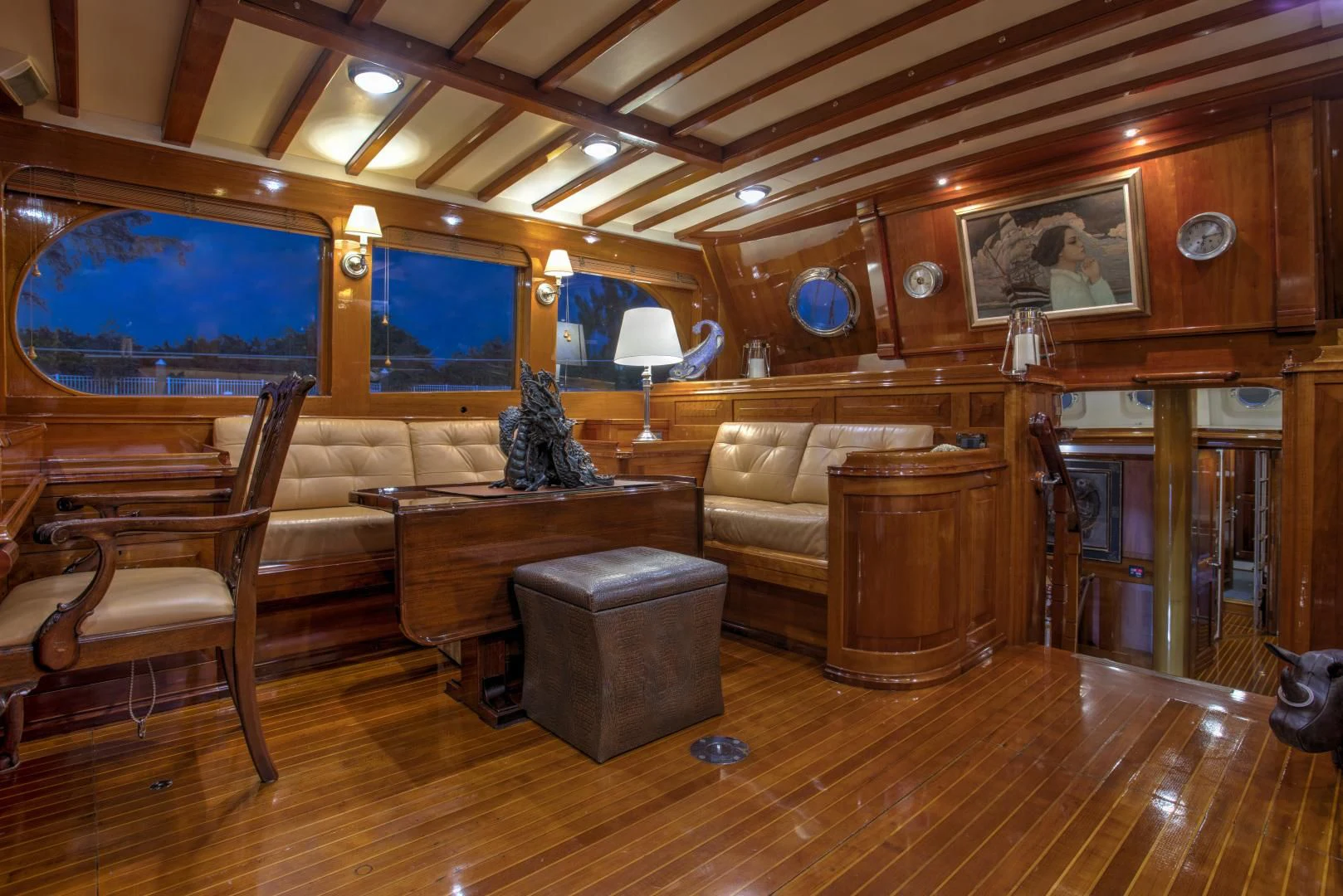 a living room with wood floors aboard SEA DIAMOND Yacht for Sale