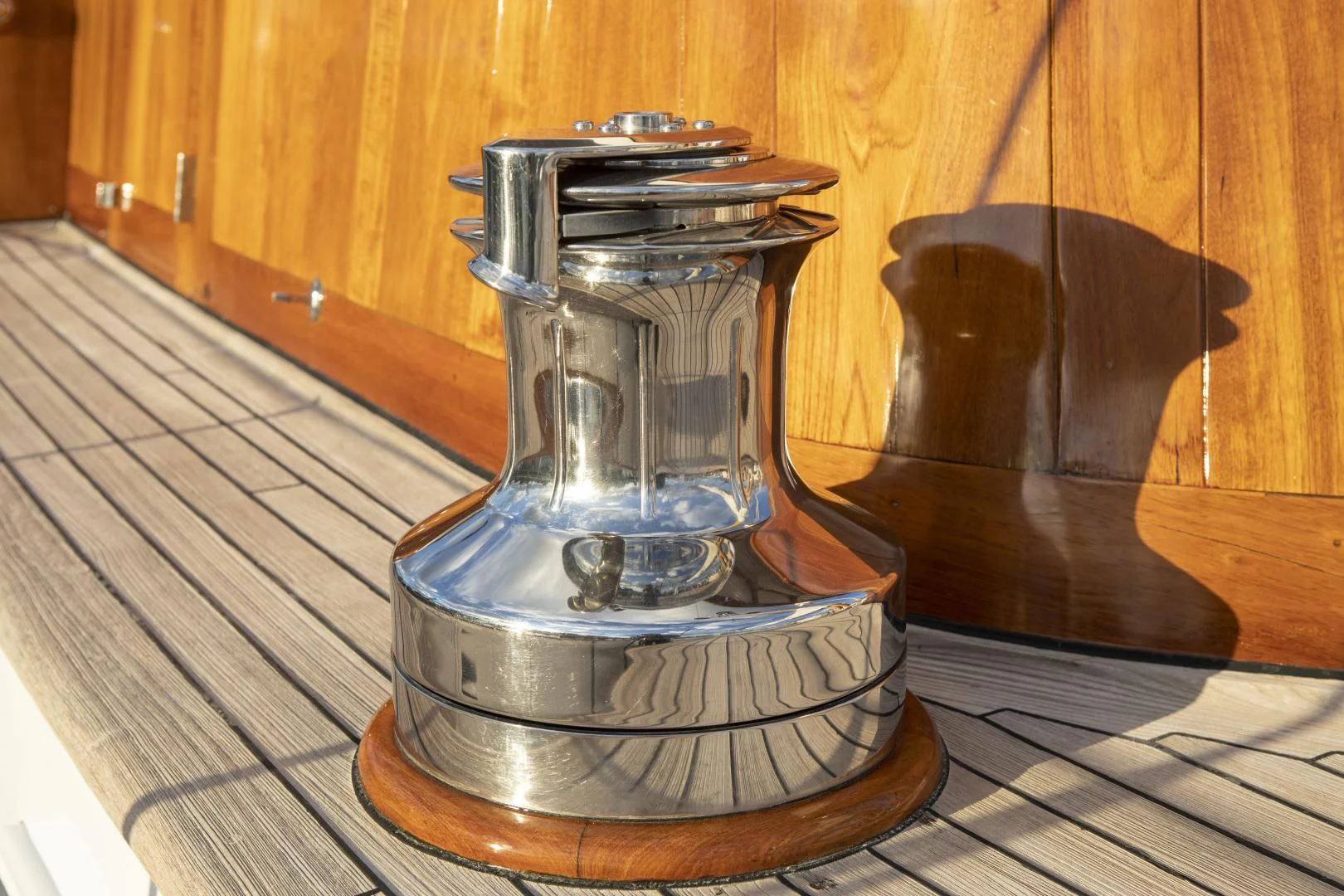 a silver metal object on a wooden surface aboard SEA DIAMOND Yacht for Sale