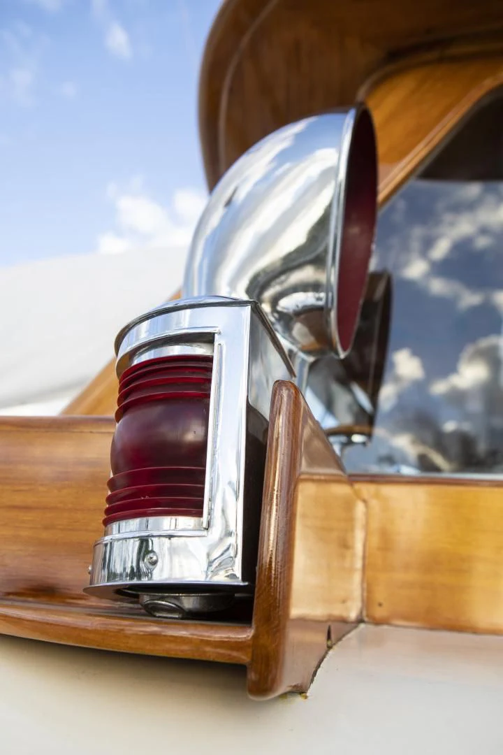 a close-up of a car's side mirror aboard SEA DIAMOND Yacht for Sale