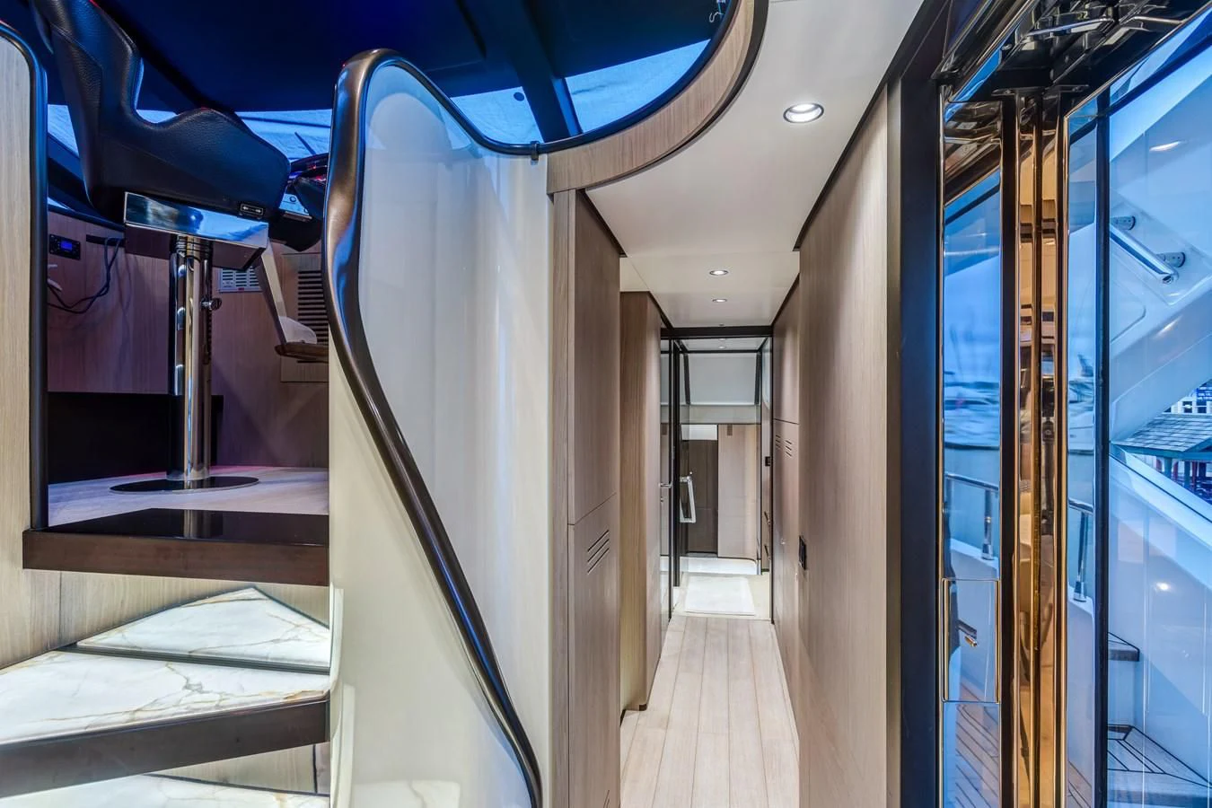 a hallway with doors aboard CAPTAIN MORGAN II Yacht for Sale