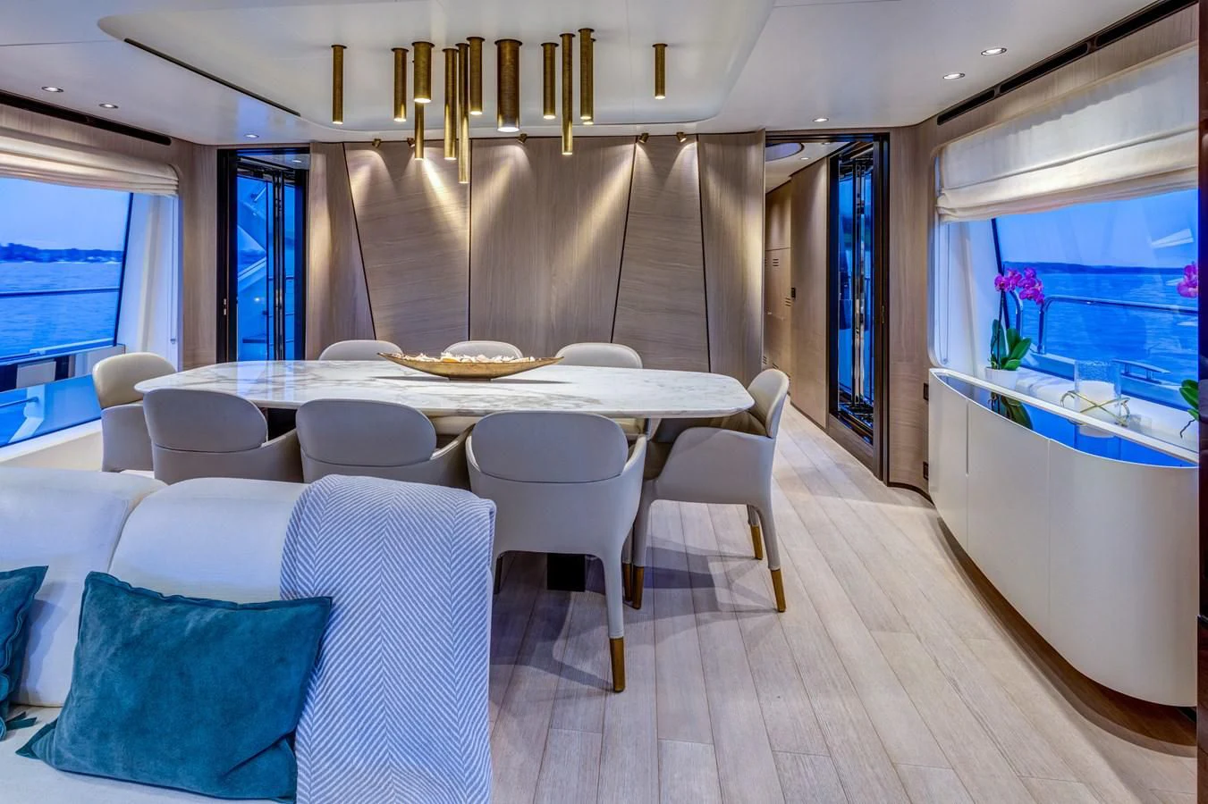 a room with tables and chairs aboard CAPTAIN MORGAN II Yacht for Sale
