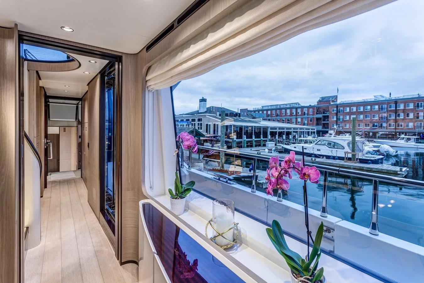 a balcony overlooking a city aboard CAPTAIN MORGAN II Yacht for Sale