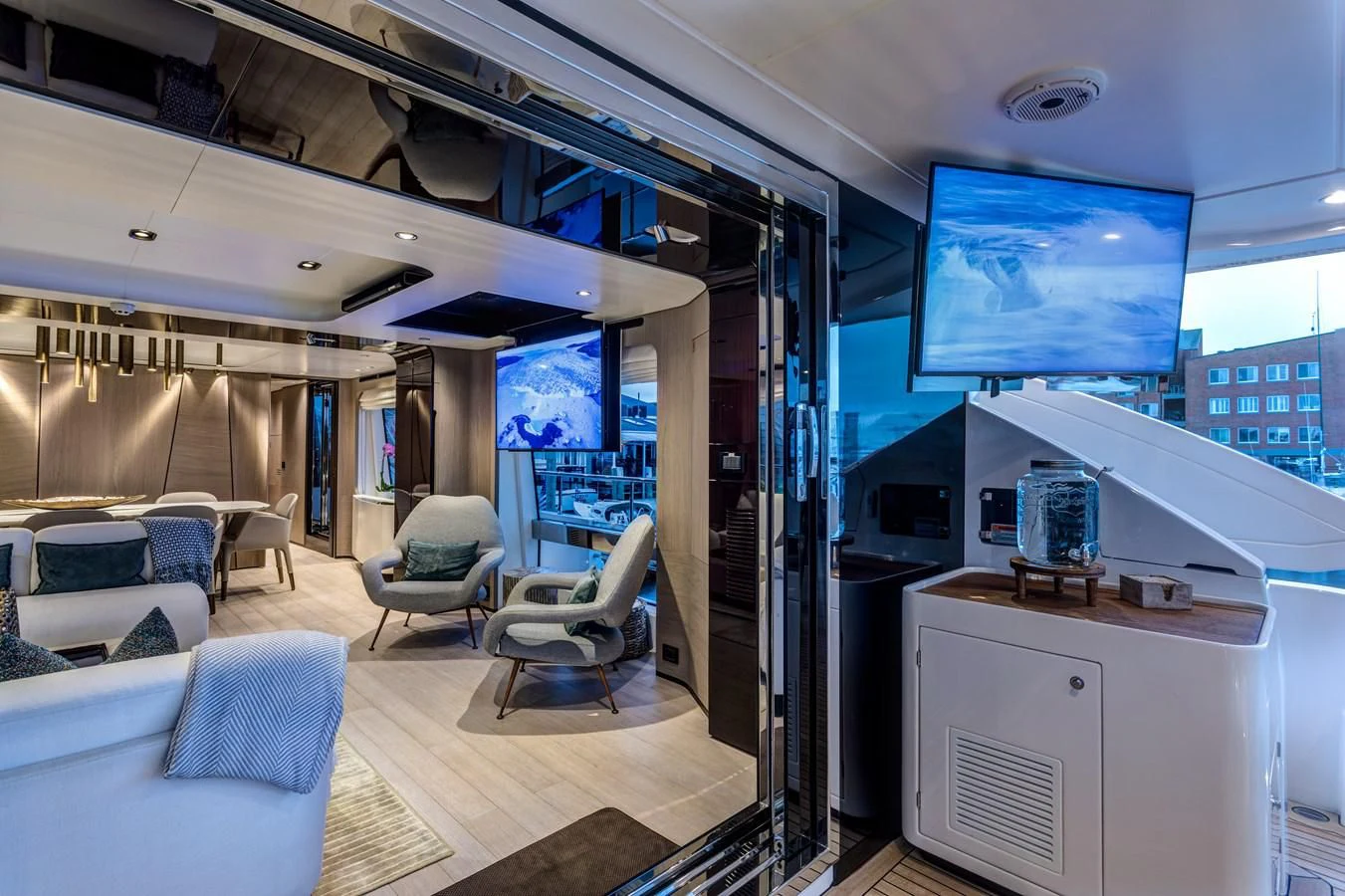a room with a large screen aboard CAPTAIN MORGAN II Yacht for Sale