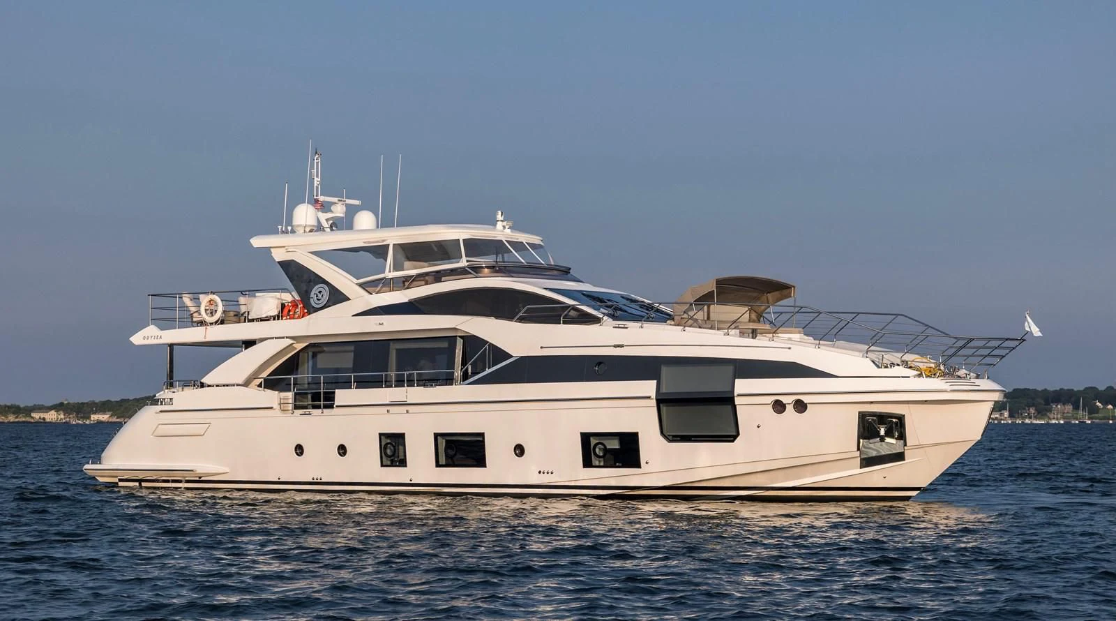 a white yacht on the water aboard CAPTAIN MORGAN II Yacht for Sale