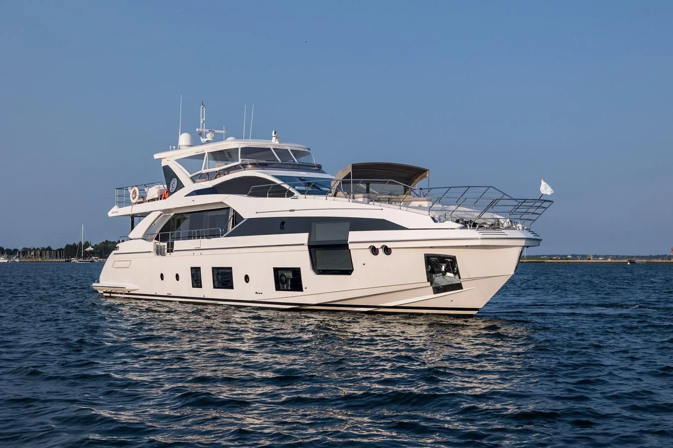 a white yacht in the water aboard CAPTAIN MORGAN II Yacht for Sale