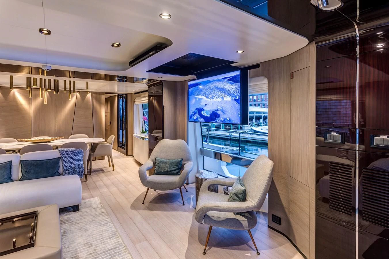a room with a large window and a view of the city aboard CAPTAIN MORGAN II Yacht for Sale