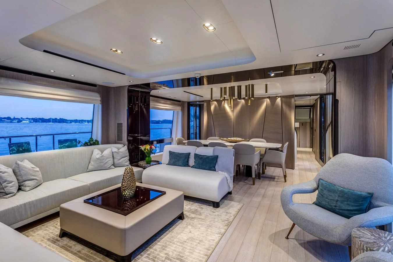 a living room with a couch and a table aboard CAPTAIN MORGAN II Yacht for Sale