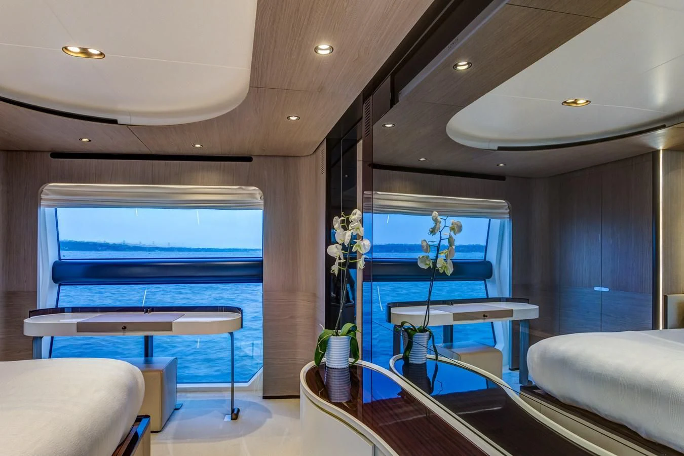 a room with a table and chairs aboard CAPTAIN MORGAN II Yacht for Sale