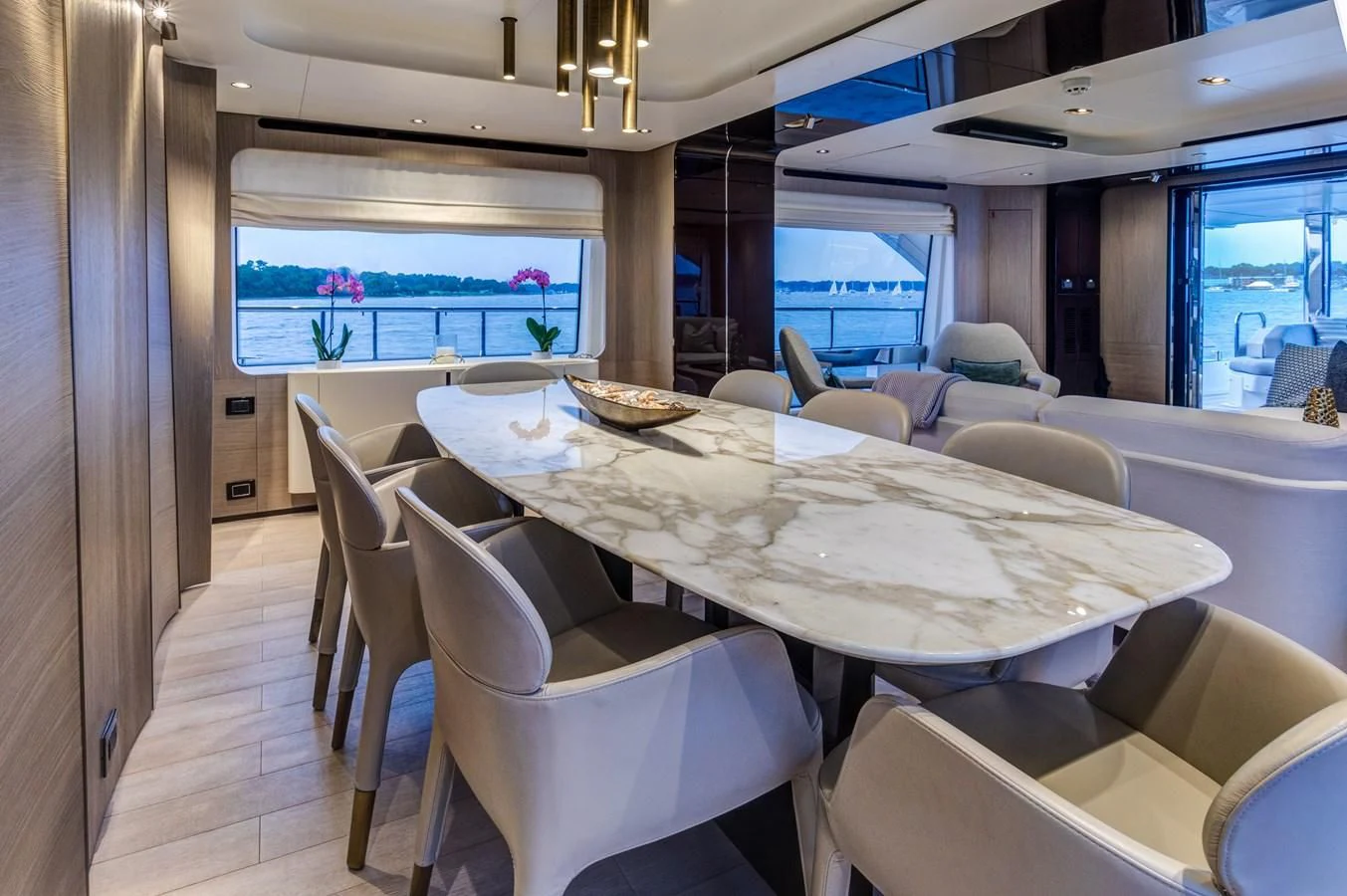 a dining room with a large table aboard CAPTAIN MORGAN II Yacht for Sale