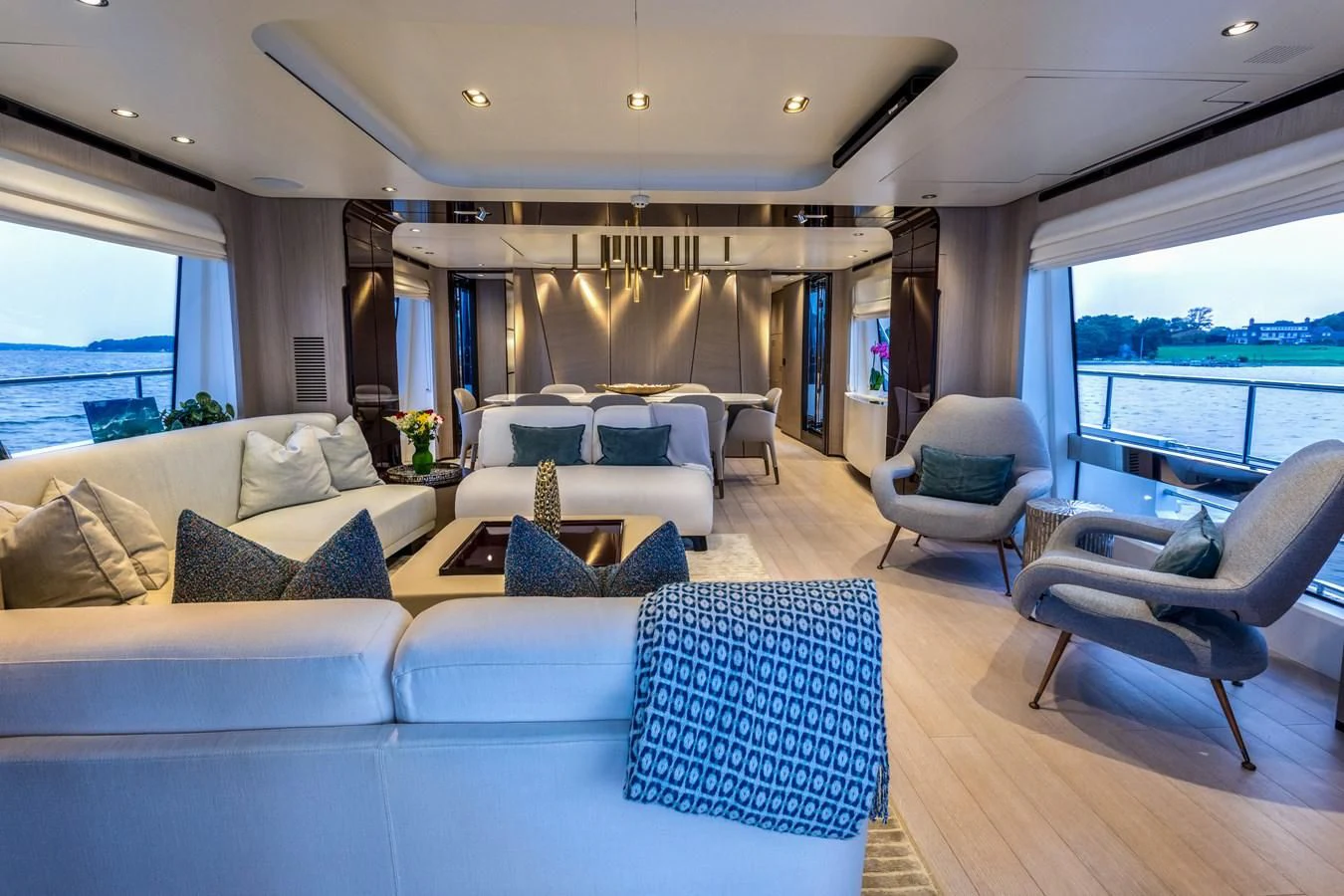 a living room with a large window aboard CAPTAIN MORGAN II Yacht for Sale