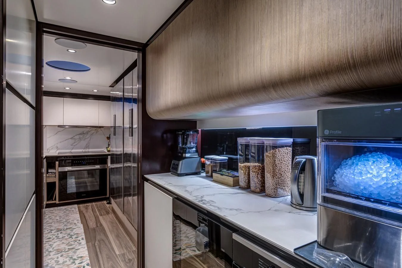 a kitchen with a glass door aboard CAPTAIN MORGAN II Yacht for Sale