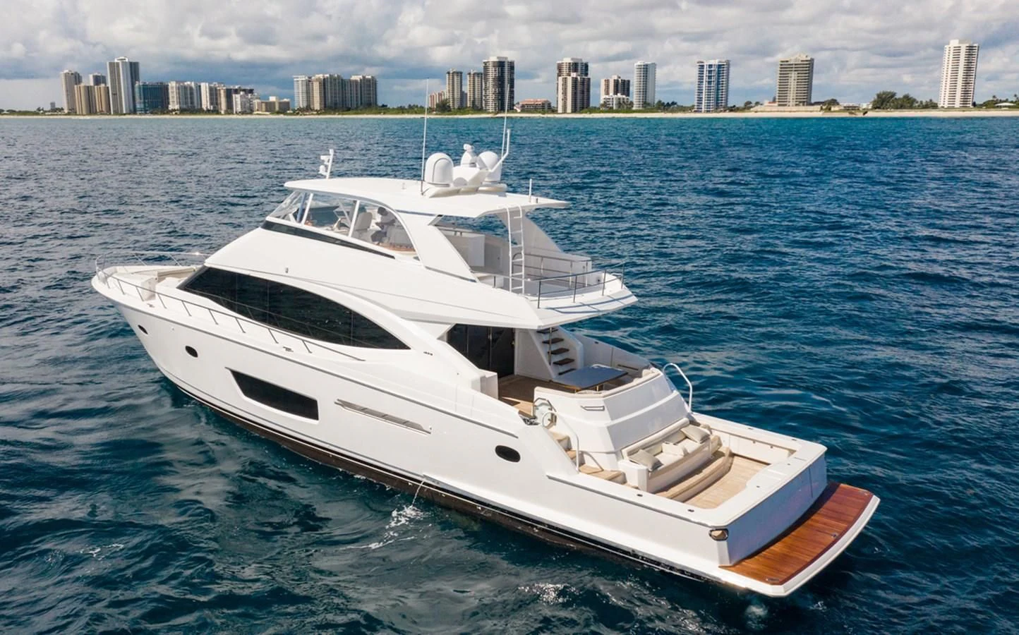 a boat on the water aboard NEW VIKING 82 COCKPIT MOTOR YACHT Yacht for Sale