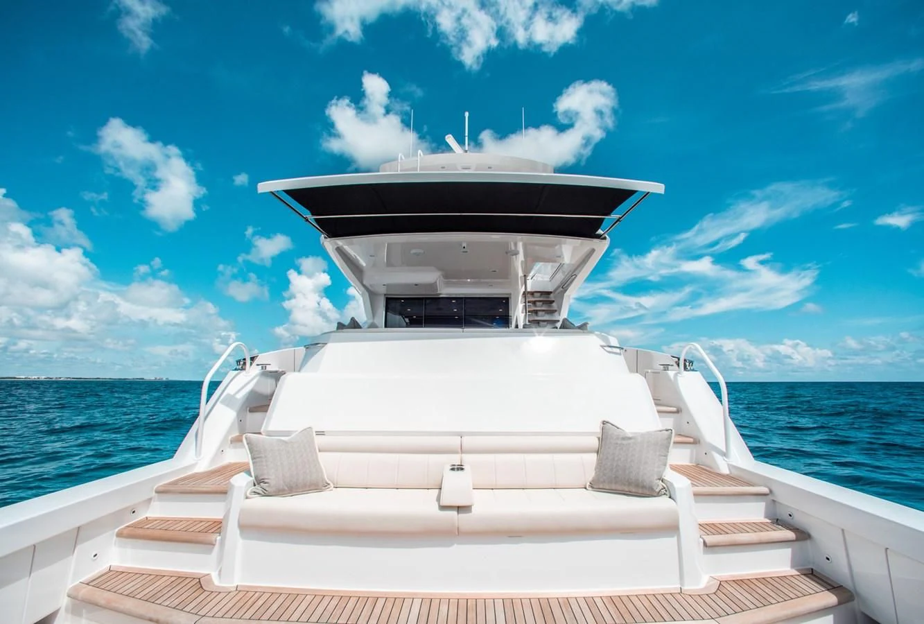 a boat on the water aboard NEW VIKING 82 COCKPIT MOTOR YACHT Yacht for Sale