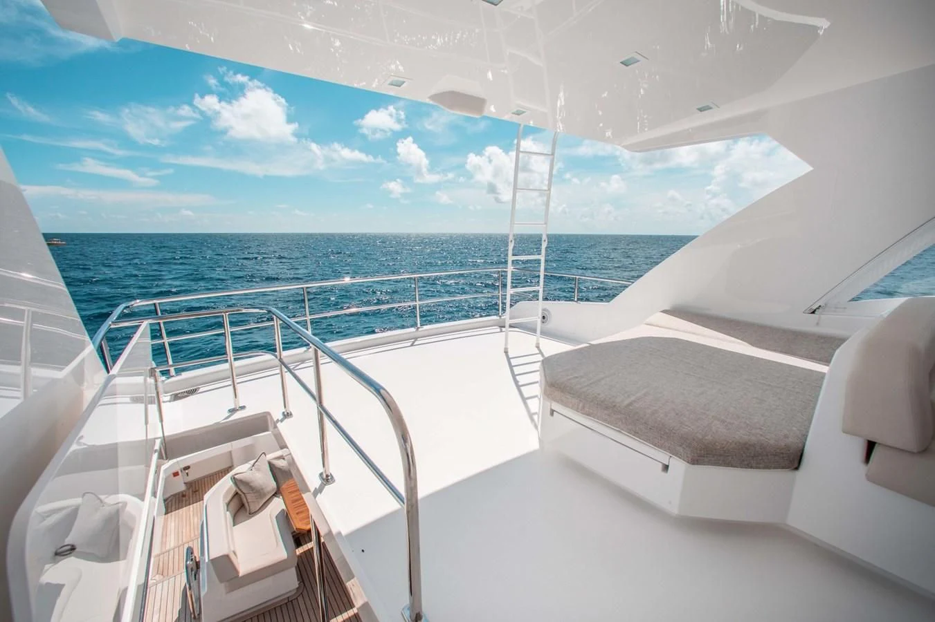 a boat on the water aboard NEW VIKING 82 COCKPIT MOTOR YACHT Yacht for Sale