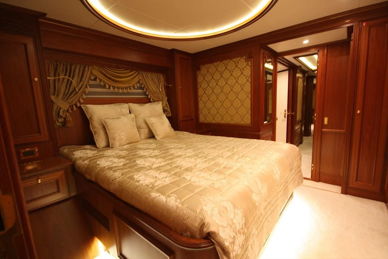 a large bed in a hotel room aboard ORION Yacht for Sale
